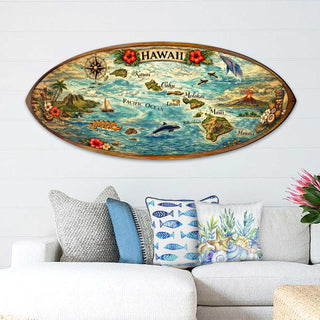 a large, colorful surfboard-shaped map of Hawaii hanging on a wall above a couch with decorative pillows.