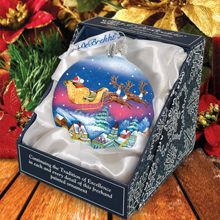 a christmas ornament in a box on a table