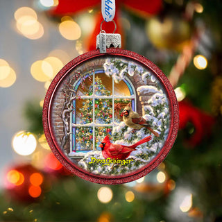 a christmas ornament hanging from a christmas tree