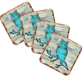 a collection of square coasters with a blue owl design on them.