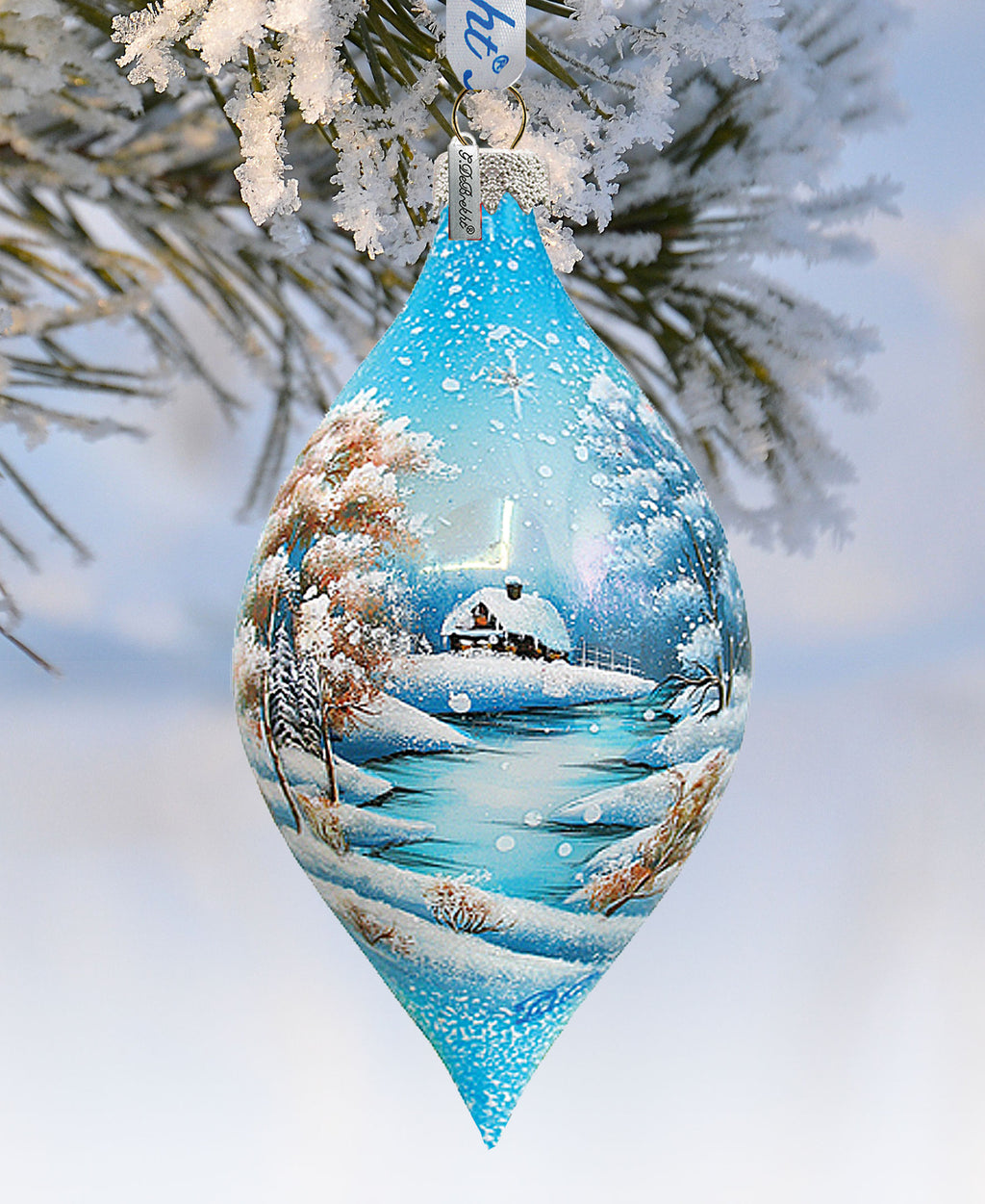 a christmas ornament hanging from a tree