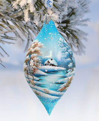 a christmas ornament hanging from a tree