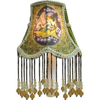 a lamp with a painting of a woman on it