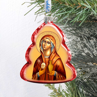 A Christmas ornament featuring a religious icon of a woman, possibly a saint or goddess, with a halo and holding a vase.