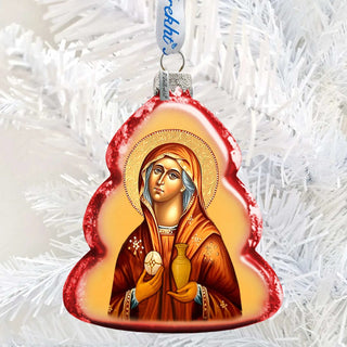 A Christmas ornament featuring a depiction of a religious figure, likely a saint or deity, with a halo and holding a vase.