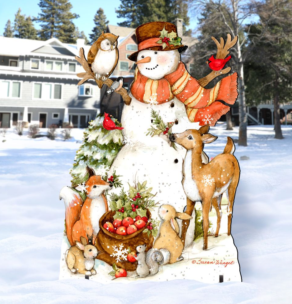A snowman decorated with various animals, including a bird, a squirrel, and a deer, standing in a snowy landscape with a house in the background.