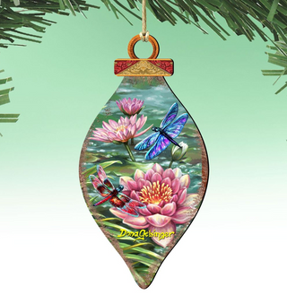 A decorative ornament featuring a dragonfly and pink water lilies against a green background.