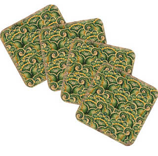 four square coasters with a repeating pattern of green and yellow shells or leaves.