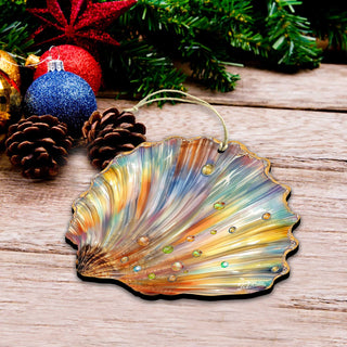 A colorful, multicolored ornament resembling a seashell is displayed on a wooden surface, surrounded by Christmas decorations such as ornaments and pine cones.