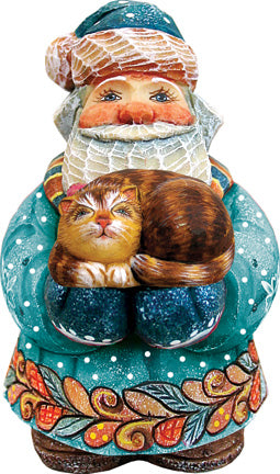 A figurine of Santa Claus holding a cat, with a colorful and detailed design.