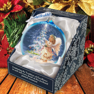 a christmas ornament in a box on a table