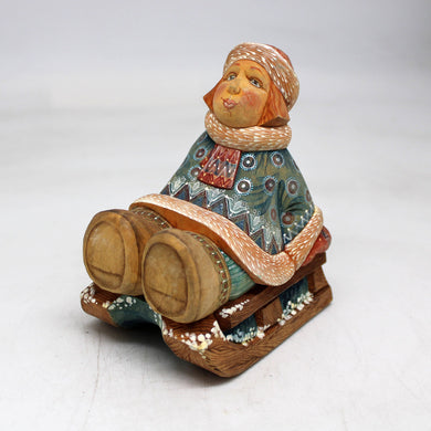 One-of-a-Kind Girl on Sleigh WOODCARVED Figurine 4.5x3.5x3 by G. Debrekht - Unique Handcrafted and Handpainted Collectible