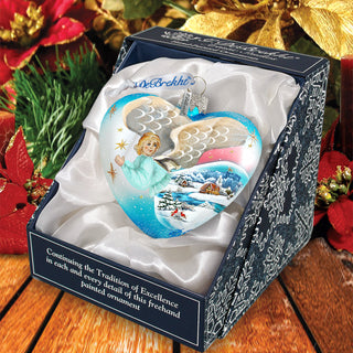 a christmas ornament in a box on a table