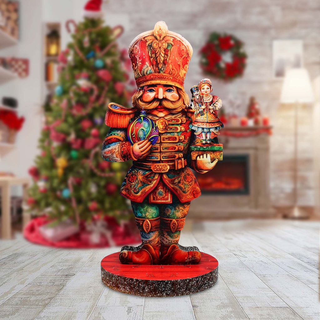 a wooden statue of a nutcracker holding a nutcracker