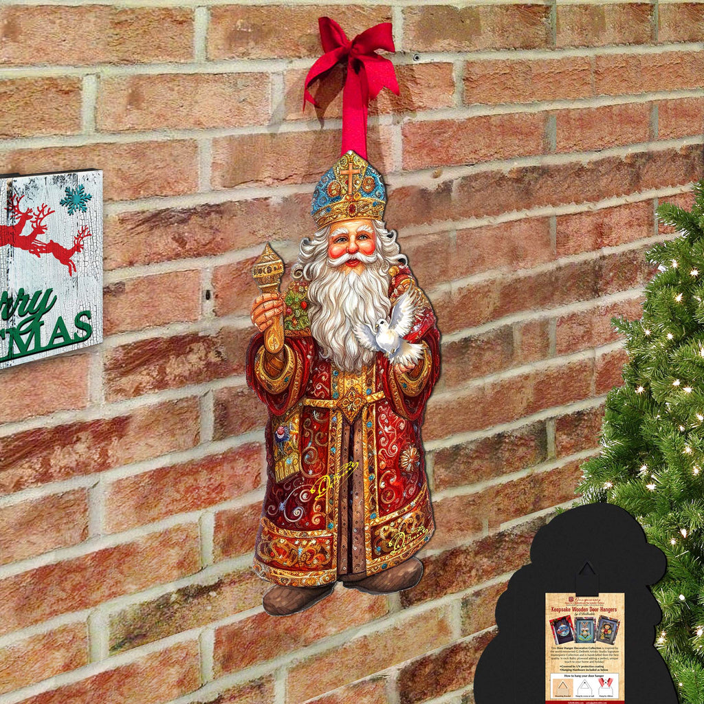a brick wall with a christmas decoration on it