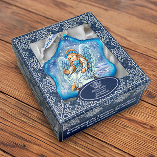 a blue box with a picture of an angel on it