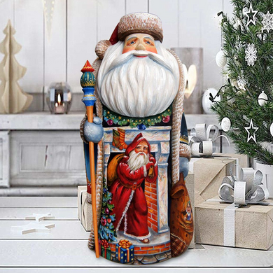 A large, colorful, and detailed Santa Claus figurine is displayed in front of a Christmas tree, with wrapped gifts and presents visible in the background.