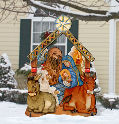 A large outdoor nativity scene depicting the Holy Family of Jesus, Mary, and Joseph, with various animals surrounding them, is set against a snowy background.