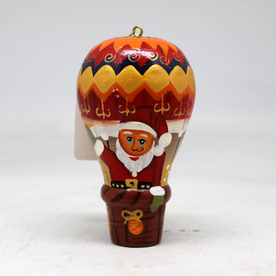 One-of-a-Kind Santa on a Balloon Wooden Ornament 35x2x2 by G. Debrekht - Unique Handcrafted and Handpainted Collectible