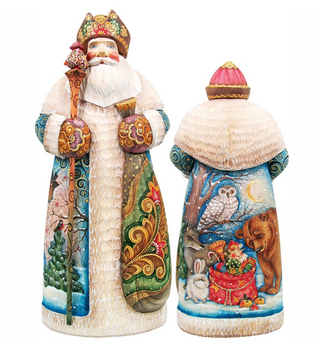 two intricately painted figurines of Santa Claus, one standing upright and the other sitting down, both adorned with detailed designs and vibrant colors.