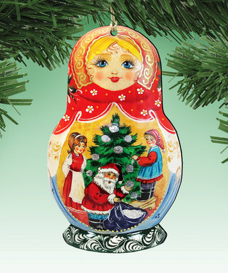 A colorful ornament featuring a Christmas tree with Santa Claus, two children, and a woman, all set against a green background.