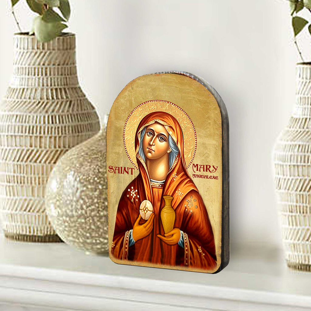 a religious icon of Saint Mary, with a golden background and a halo around her head. The text