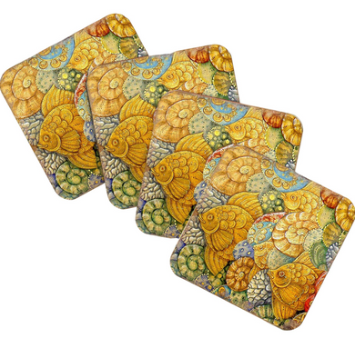 a set of four square coasters with a vibrant, colorful design of fish and other marine life.