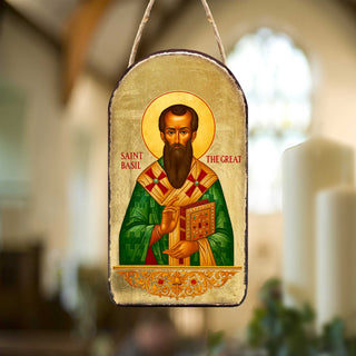 a religious icon of Saint Basil, a bearded saint, wearing a green robe and holding a book.