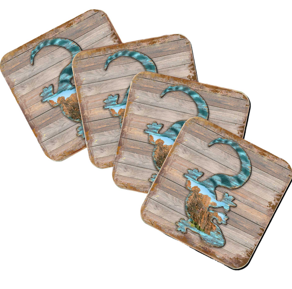 four square coasters with a wooden texture and a stylized lizard design on them.