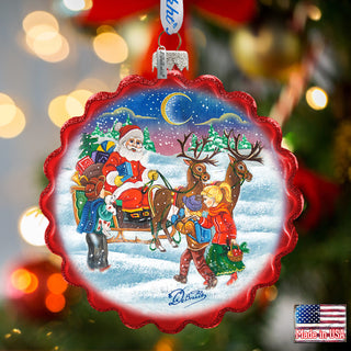 a christmas ornament hanging from a christmas tree