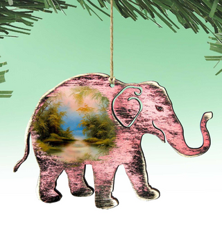 A pink elephant ornament with a landscape scene inside, hanging from a string.