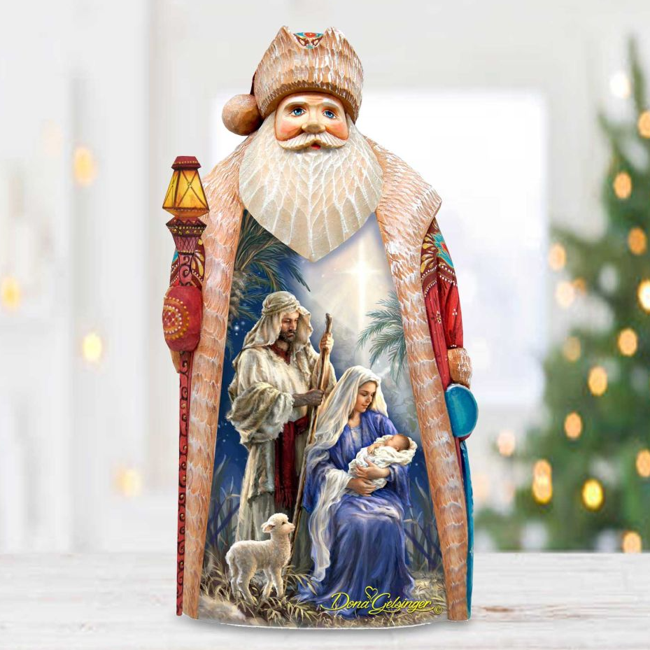 Santa Claus figurine with a nativity scene depicting the birth of Jesus Christ, including the baby Jesus, Mary, and Joseph.