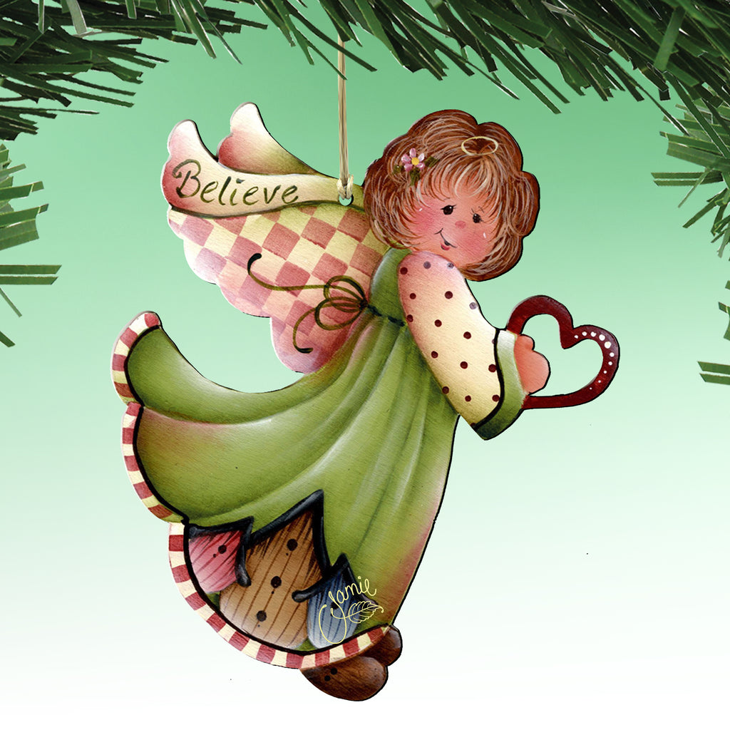 A colorful ornament of an angel holding a heart and the word