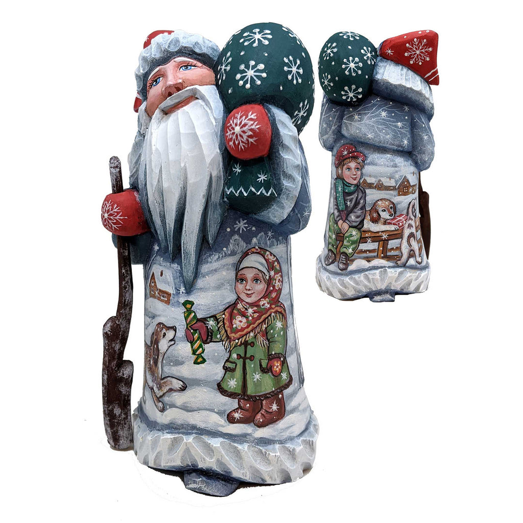 two figurines of Santa Claus, one larger and one smaller, both adorned with snowflakes and winter scenes.