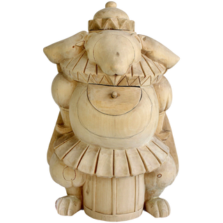 A wooden sculpture of a whimsical, fantastical creature with a large head, a ruffled skirt, and a pointed hat.