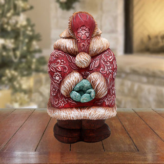 a ceramic figurine of a turkey sitting on a table