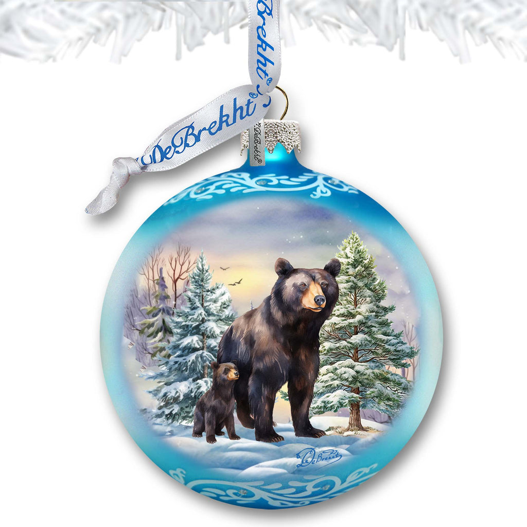 a christmas ornament with a bear and cub on it