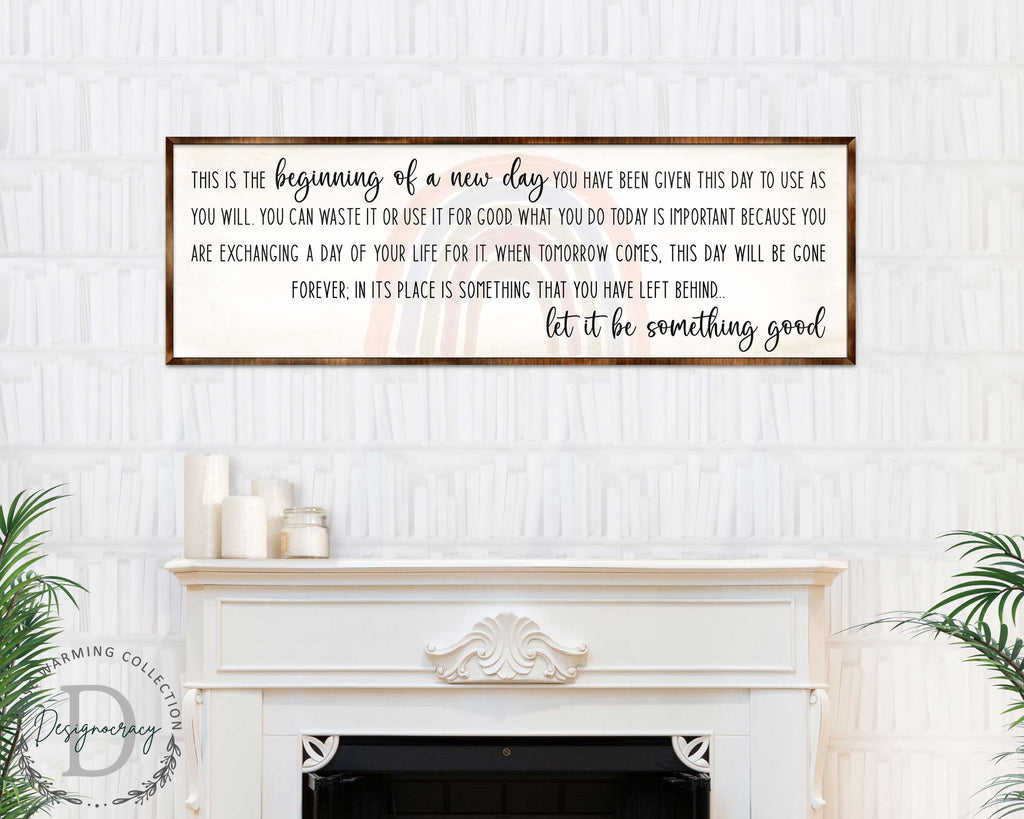 a framed inspirational quote on a white wall above a fireplace, which reads: