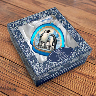 a box with a picture of two penguins inside of it