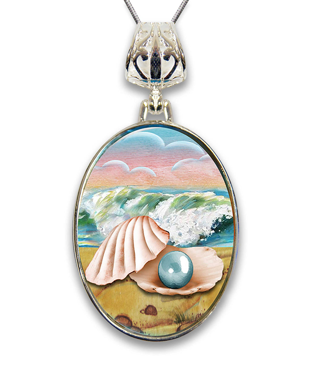 A pendant necklace with a circular design featuring a seashell with a pearl inside, set against a beach scene with waves crashing in the background.