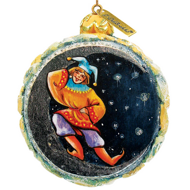 A round ornament featuring a jester-like figure in a colorful outfit against a starry night sky background.