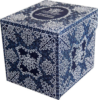 A blue and white box with a snowflake pattern, featuring a central circular design.