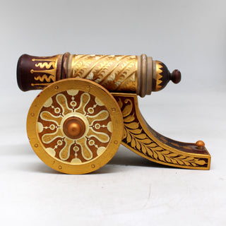 a wooden spinning wheel on a white surface