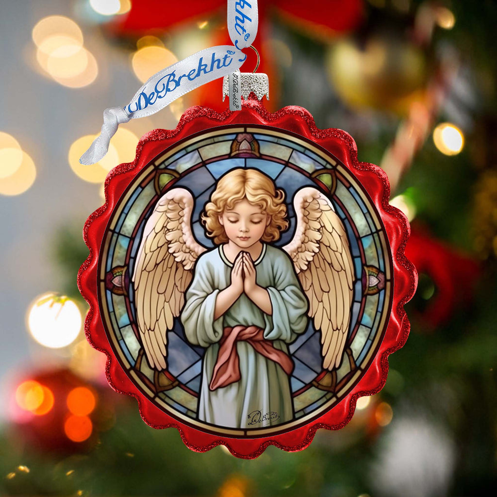 a christmas ornament with an angel on it
