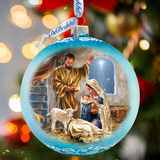 a christmas ornament with a nativity scene on it