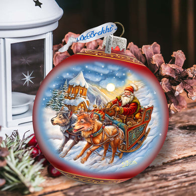 a christmas ornament with a santa on a sleigh