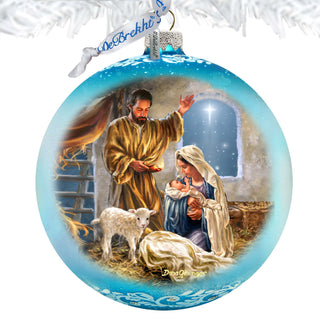 a christmas ornament with a nativity scene on it