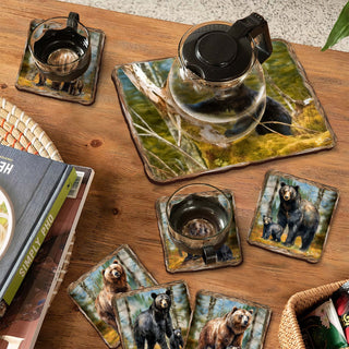 a wooden table topped with coasters covered in pictures
