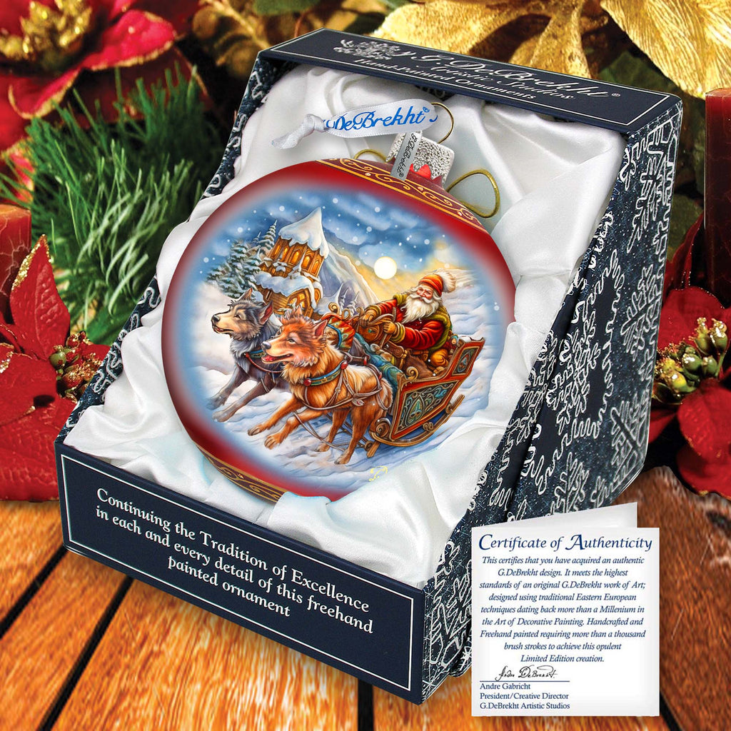 a christmas ornament with santa riding a sleigh