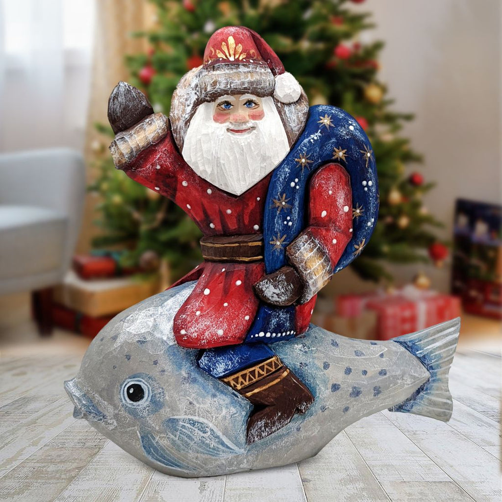 Treasure Fish Santa Woodcarved Figurine Unique hand carvings made from Linden wood. Fine details and beautiful artwork. Hand-Painted by world-renowned artists, limited edition collectibles. 820011